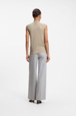 Sleeveless mock-neck sweater in merino wool, White