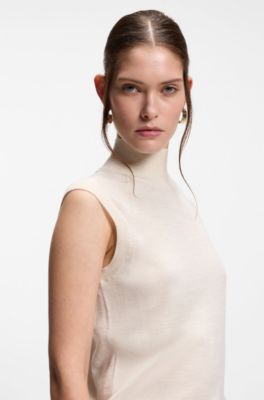 Sleeveless top in merino wool with mock neck, White