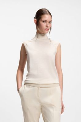 Sleeveless top in merino wool with mock neck, White