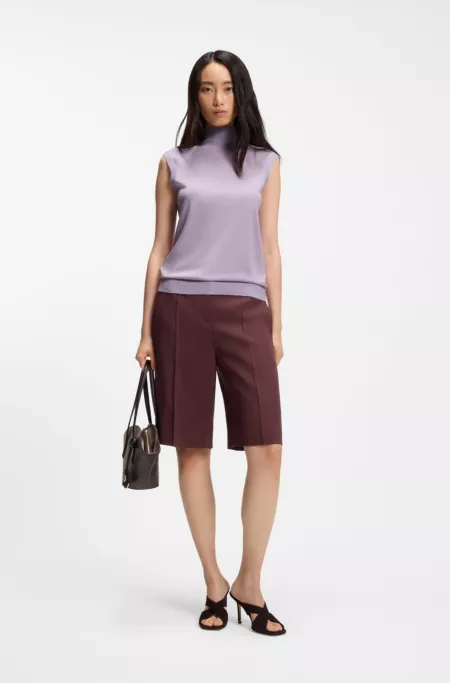 Sleeveless top in merino wool with mock neck