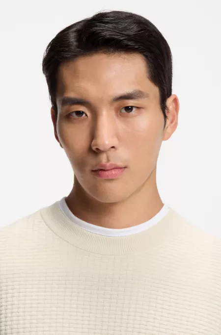 Cotton sweater with knitted structure