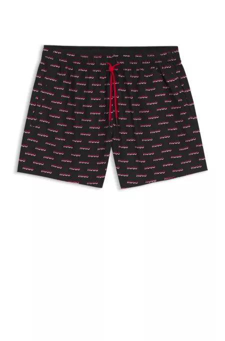 Swim shorts with split-logo print