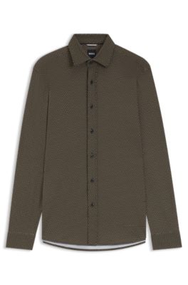 Camisa slim fit de algod&oacute;n el&aacute;stico con estampado de monogramas, Beige