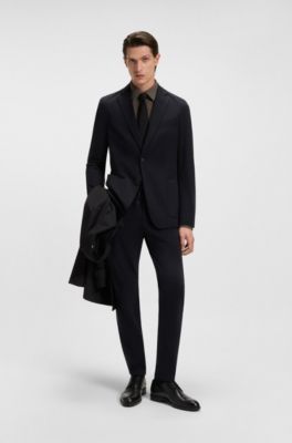 Camisa slim fit de algod&oacute;n el&aacute;stico con estampado de monogramas, Beige