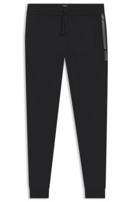 Logo-print tracksuit bottoms in cotton terry, Black