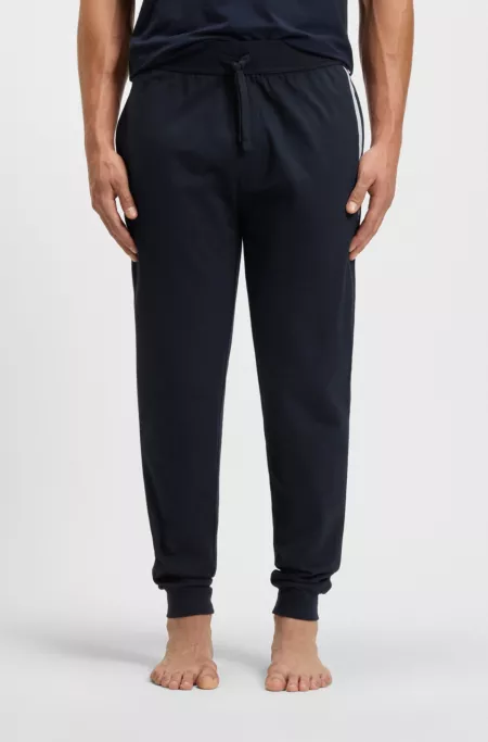 Logo-print tracksuit bottoms in cotton terry