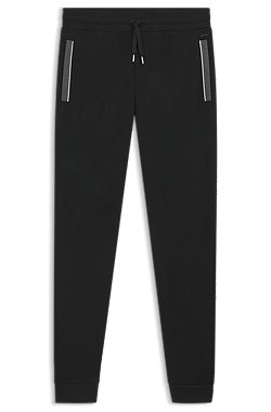 Pantalones de chándal en algodón elástico con detalle de bolsillo