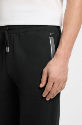 Pocket-detail tracksuit bottoms in a cotton blend, Black