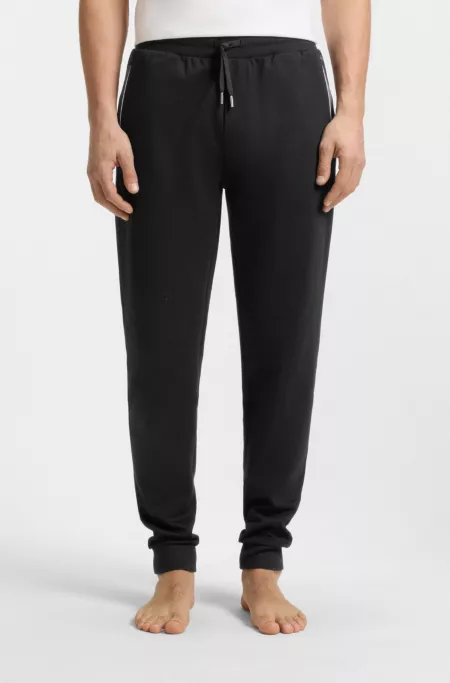Pocket-detail tracksuit bottoms in a cotton blend