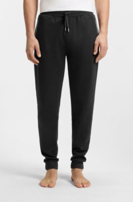 Pocket-detail tracksuit bottoms in a cotton blend, Black