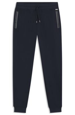 Pocket-detail tracksuit bottoms in a cotton blend, Dark Blue