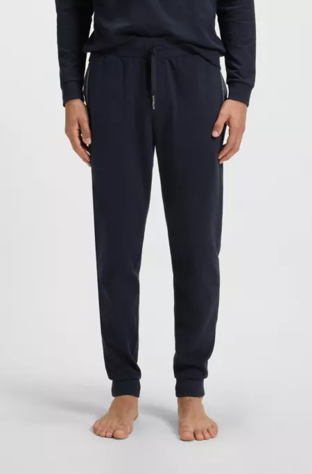 Pocket-detail tracksuit bottoms in a cotton blend