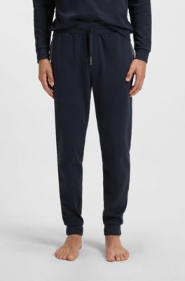 Pocket-detail tracksuit bottoms in a cotton blend, Dark Blue