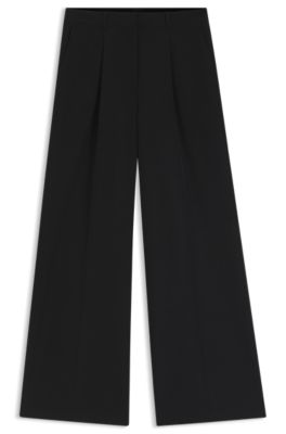 Pantalones de pernera ancha en tejido el&aacute;stico, Negro