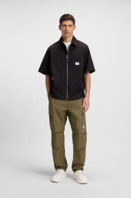 Pantalones relaxed fit en tejido antidesgarros, Cal