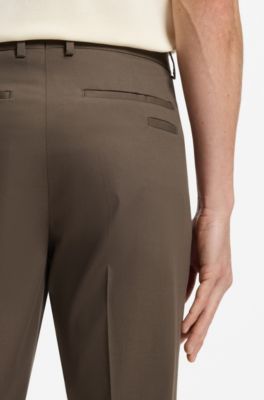 Pantalones slim fit de algod&oacute;n, seda y el&aacute;stico, Marr&oacute;n