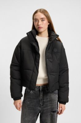 Chaqueta acolchada relaxed fit repelente al agua con insignia de HUGO, Negro