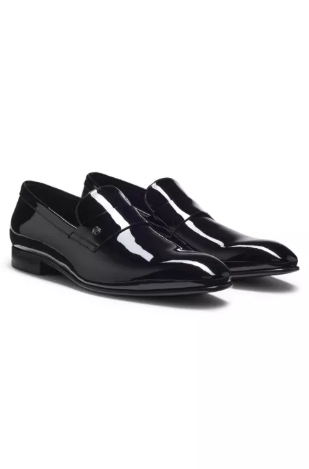 Penny loafers in patent faux leather