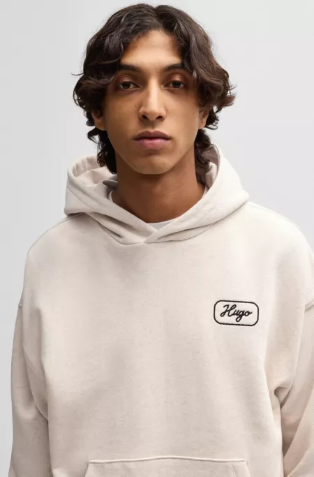 Cotton-terry hoodie with embroidered artwork