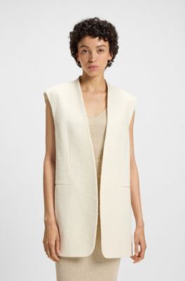 Blazer relaxed fit sin mangas en boucl&eacute; de algod&oacute;n italiano, Blanco