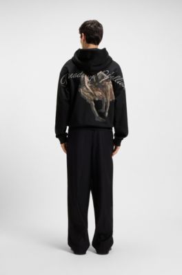 Prenda con capucha oversize fit en felpa de algod&oacute;n con ilustraci&oacute;n de bailarina, Negro