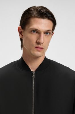 Chaqueta slim fit de tejido el&aacute;stico lavable a m&aacute;quina, Negro