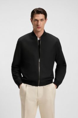 Chaqueta slim fit de tejido el&aacute;stico lavable a m&aacute;quina, Negro