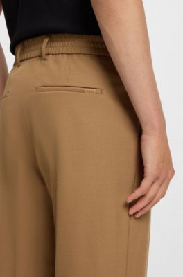 Pantalones tapered fit de tejido el&aacute;stico lavable a m&aacute;quina, Beige