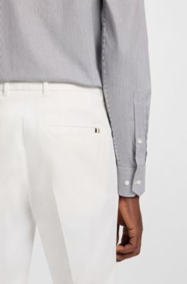 Slim-fit trousers in stretch cotton, White