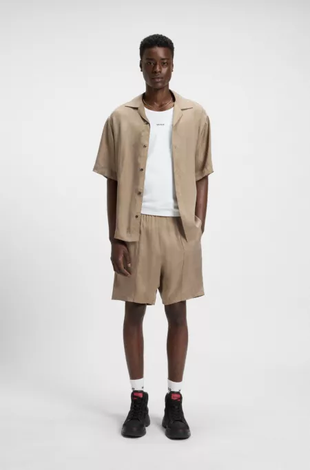 Relaxed-fit shorts in lustrous twill