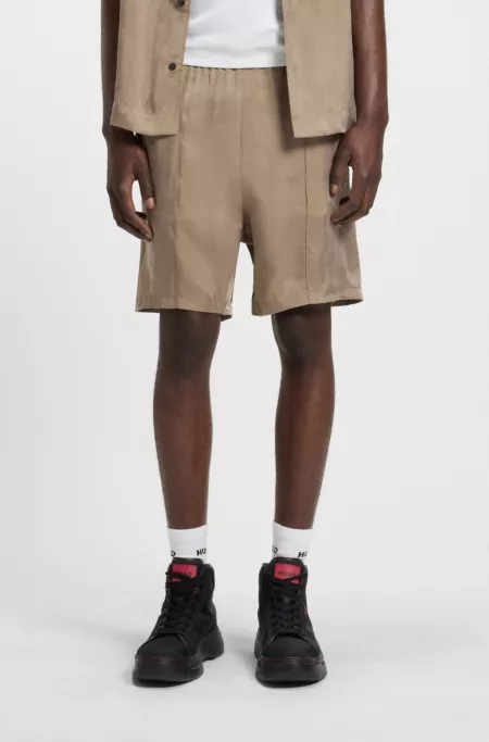 Relaxed-fit shorts in lustrous twill