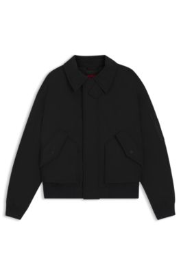 Veste matelass&eacute;e Regular en tissu d&eacute;perlant, Noir