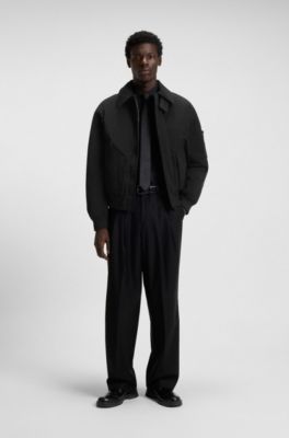 Veste matelass&eacute;e Regular en tissu d&eacute;perlant, Noir