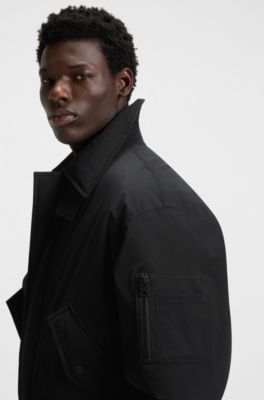 Veste matelass&eacute;e Regular en tissu d&eacute;perlant, Noir