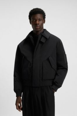 Veste matelass&eacute;e Regular en tissu d&eacute;perlant, Noir
