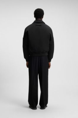 Veste matelass&eacute;e Regular en tissu d&eacute;perlant, Noir