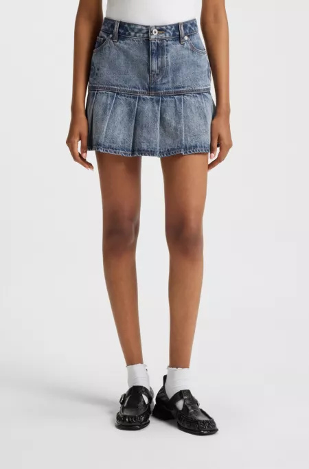 Blue rigid-denim mini skirt with half pleating