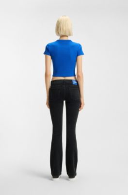 Jeans acampanados de c&oacute;modo denim el&aacute;stico negro, Negro