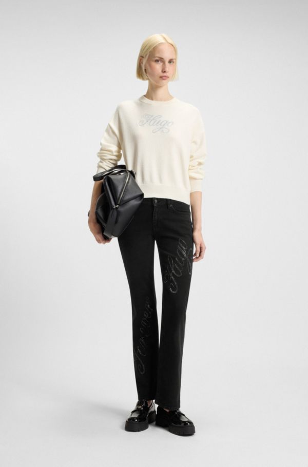 Slim-fit jeans with rhinestone logos - image 2