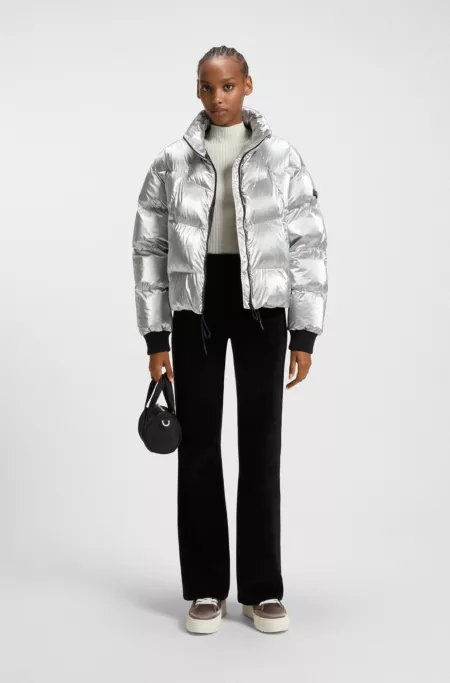 Puffer jacket with silicone logo badge