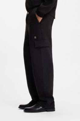 Pantalones de ch&aacute;ndal en mezcla de algod&oacute;n con cinta con motivos geom&eacute;tricos, Negro