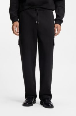 Pantalones de ch&aacute;ndal en mezcla de algod&oacute;n con cinta con motivos geom&eacute;tricos, Negro