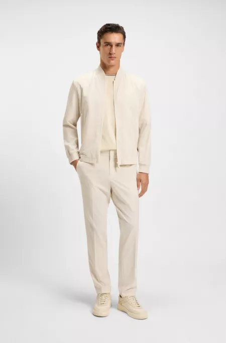 Water-repellent packable jacket with two-way zip