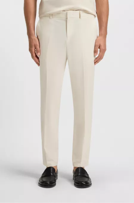 Packable trousers in water-repellent stretch fabric