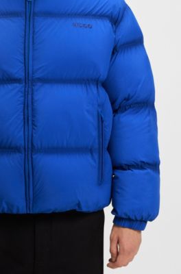 Chaqueta acolchada repelente al agua con logo bordado, Celeste
