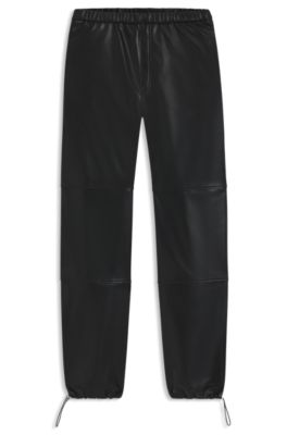 Wide-leg parachute trousers in faux leather, Black