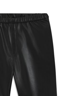 Pantalones de estilo paraca&iacute;das de pernera ancha en piel sint&eacute;tica, Negro