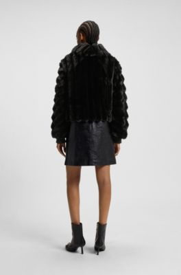 Chaqueta de imitaci&oacute;n de piel con dobladillo ajustable, Negro