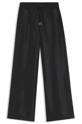 Pantalones relaxed fit de pernera ancha con cord&oacute;n en la cintura, Negro