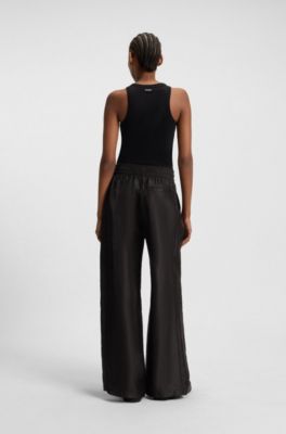 Pantalones relaxed fit de pernera ancha con cord&oacute;n en la cintura, Negro